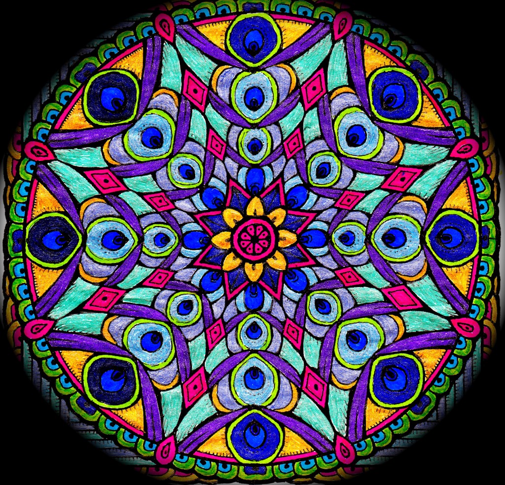 A recent mandala. It's created with gold, metals, and lots of iridescence. Peacock inspired.